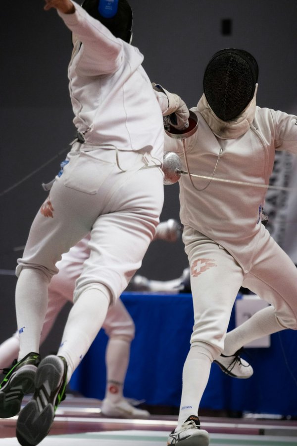 What role does vision training play in the performance of UK fencing athletes?